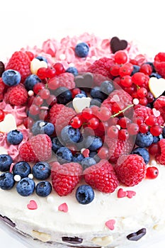 Homemade creamy cake decorated with fresh berries