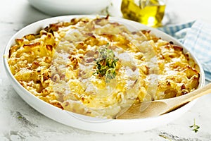 Homemade creamy mac`n`cheese with herbs