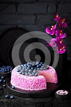 Homemade crepe cake with pink coconut pitahaya cream