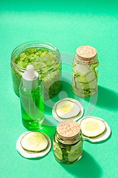 Homemade cucumber cosmetics. Detoxification skin vegetable masks. Natural face lotion, sea salt and tonic water