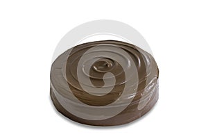 Homemade dark chocolate fudge cake on white isolated background with clipping paths. Plain sponge cake frosting with chocolate to