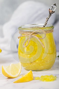 Homemade delicacy natural lemon jam marmalade, Kurd in a glass jar photo