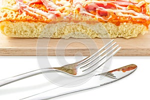 Homemade delicious fresh a slice of pizza on wooden plate.