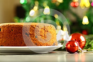 Homemade delicious plum cake on a Christmas background
