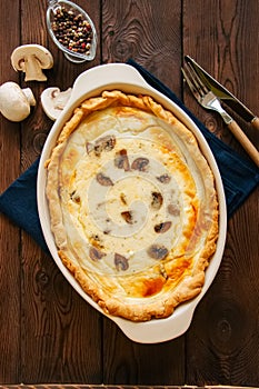 Homemade delicious quiche with mushrooms and cheese