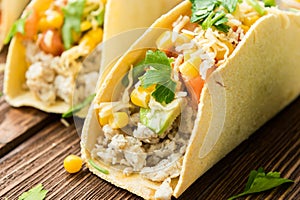 Homemade delicious tacos with chicken and vegetables