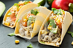 Homemade delicious tacos with chicken and vegetables