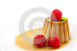 Homemade dessert and smooth custard sweets concept with close up on creme caramel, flan, or caramel pudding covered in sweet syrup