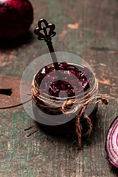 Homemade DIY natural healthy red onion marmalade jam, confiture. top view, vertical image, place for text