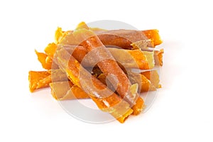 Homemade dried sweet mango paste made from ripe mangoes mixed with sugar and salt isolated on white background