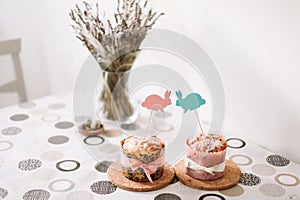 Homemade Easter cakes  with decorations. Easter holiday background, spring season.  Spring still life. top view. copy space
