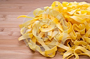 Homemade egg pasta on a cutting board