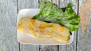 Homemade egg rolls on wooden background. healthy diet weight loss. with clipping path