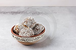 Homemade energy balls made from dates, dried apricots, nuts and oatmeal