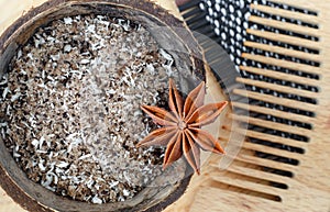 Homemade face and body scrub foot soak with sugar, ground cofee, coconut oil and shredded coconut. Diy natural beauty treatment