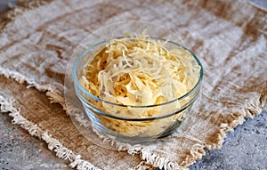 Fermented cabbage or sauerkraut in a glass bowl