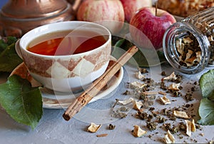 Homemade fermented tea made from fresh apple leaves with dried apple pieces