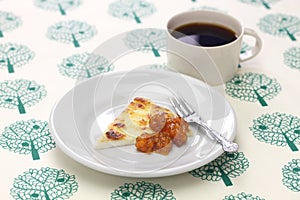 Homemade finnish squeaky cheese with cloudberry jam and coffee