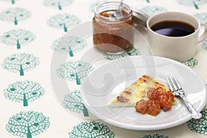 Homemade finnish squeaky cheese with cloudberry jam and coffee photo
