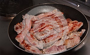 Homemade food.Fried tuna fillet in a pan.