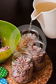 Homemade foreshank meat food in jars.