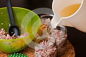 Homemade foreshank meat food in jars.