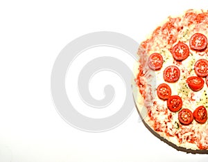 Homemade four cheese pizza with basil and oregano over white background with copyspace