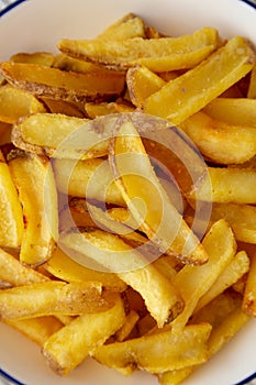 Homemade French Fries on a Plate, top view. Flat lay, overhead, from above. Close-up
