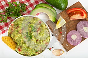 Homemade Fresh Guacamole with ingredients