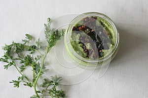 Homemade fresh spicy and hot condiment made with coriander, coconut shallots and green chilly. Locally known as coriander coconut