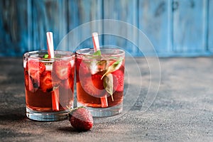 Homemade fresh strawberry lemonade with basil leaves