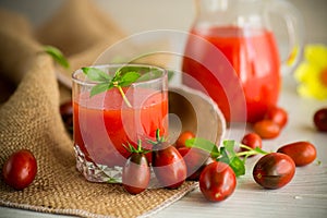 homemade freshly squeezed tomato juice with pulp in a glass decanter
