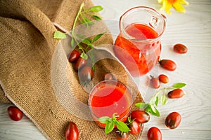 homemade freshly squeezed tomato juice with pulp in a glass decanter