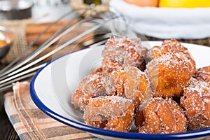 Homemade fritters with sugar