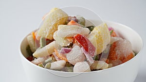 Homemade frozen various vegetables. Frozen vegetable mix on white background