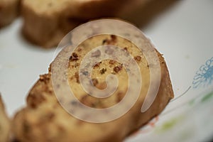 Homemade garlic bread in white plate photo