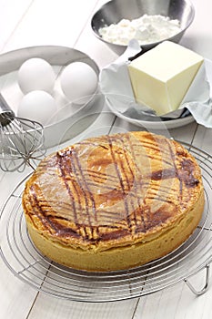 Homemade gateau basque on cake cooler, freshly baked