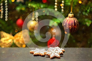 homemade gingerbread cookies on Christmas tree background
