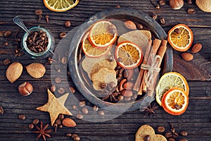 Homemade gingerbread cookies, spices and decorations