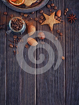 Homemade gingerbread cookies, spices and decorations