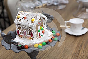 Homemade gingerbread house Christmas spices with ornament