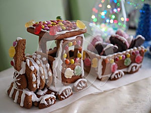 Homemade gingerbread Northern Express Christmas decoration with children