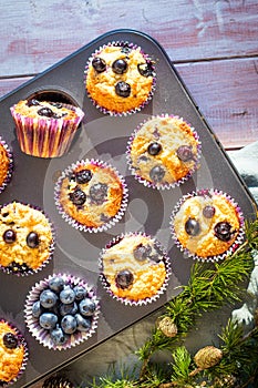 Homemade gluten free almond flour blueberry muffins in the baking tray