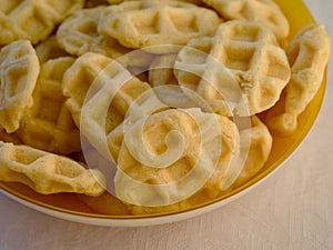 Homemade gluten free cookies in a yellow plate on a table