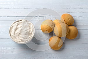 Homemade gluten free cottage cheese rice cookies and bowl rice flour on light background