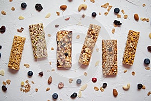 Homemade gluten free granola bars with mixed nuts, seeds, dried fruits