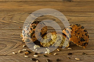 Homemade Gluten-free vegan pumpkin scones with seeds on wooden table