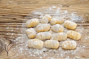 Homemade Gnocchi on wooden board