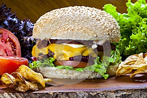 Homemade gourmet burger with delicious fresh ingredients