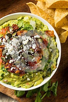 Homemade Gourmet Fancy Guacamole with Toppings photo